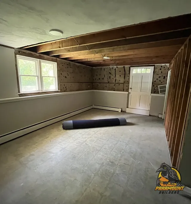 Flood-damaged basement stripped to the studs