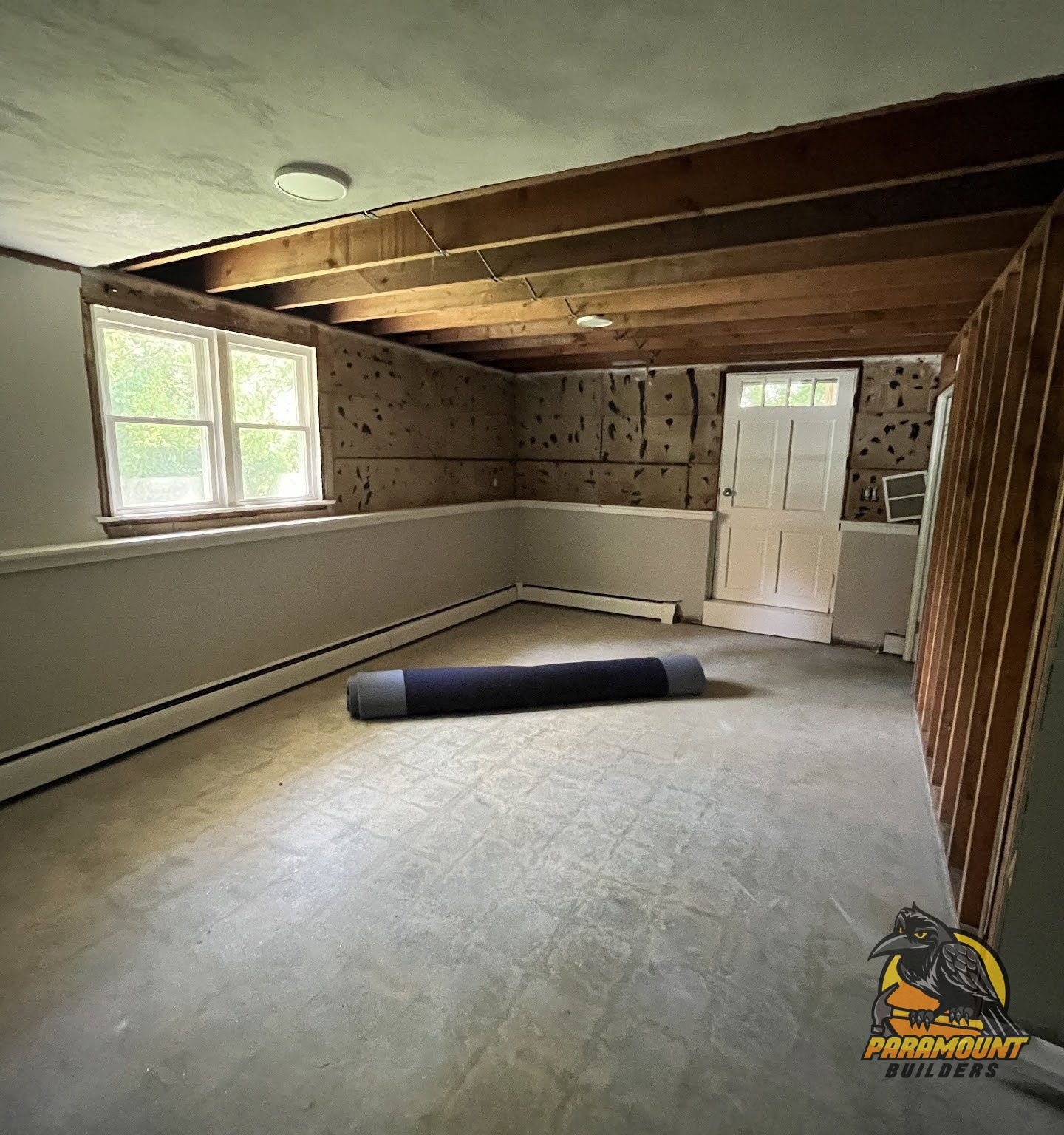 Flood-damaged basement stripped to the studs