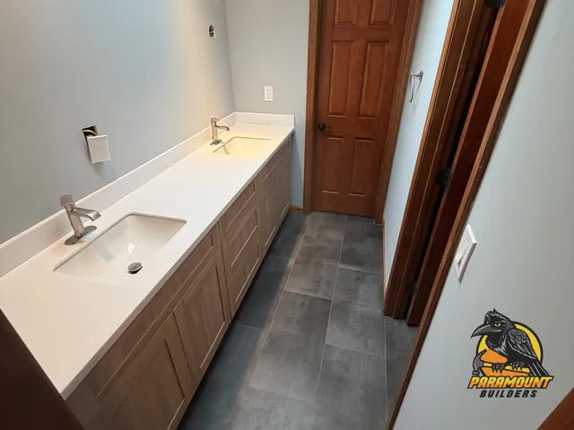 Finished bathroom with double vanity, quartz top and tile floor - Reconstruction, home after, South Glastonbury, CT