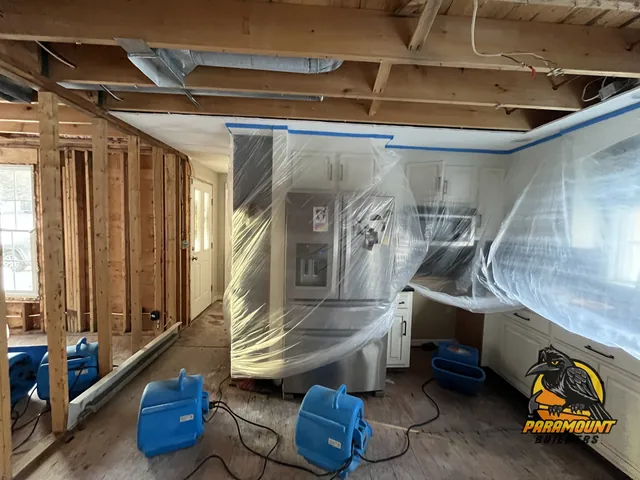 Kitchen under poly containment with several air movers running - Reconstruction, kitchen in progress, South Windsor, CT
